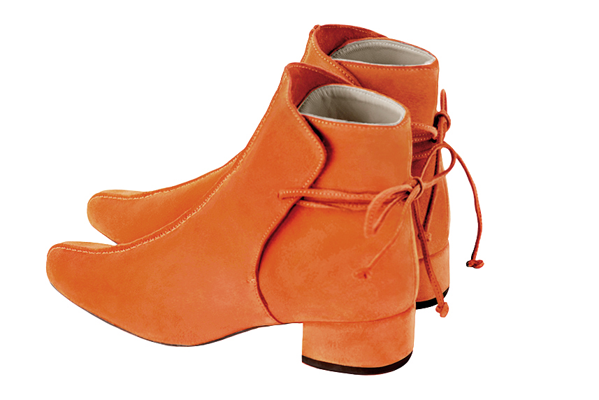 Clementine orange women's ankle boots with laces at the back. Round toe. Low block heels. Rear view - Florence KOOIJMAN